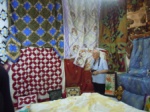 Musa Kayra admiring the quilts